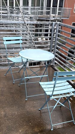 Patio table and two chairs