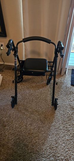 Walker with seat