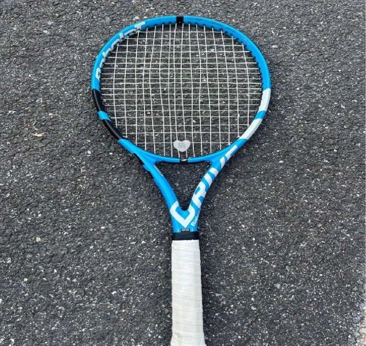 him fine Refine Your Tennis Play with Ultra-Light Titanium Racquets!