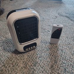 Plug in wall heater with remote
