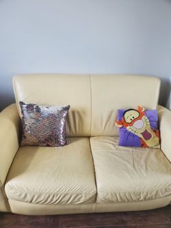 Leather loveseat with end table