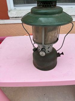 This Chinese lantern is an antique; it needs cleaning and measures 14 inches in height