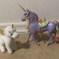 2 Unicorns. One Plush And the other Interactive Toy 