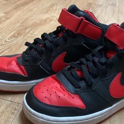 Black and red Nikes