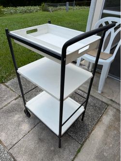 Last chance IKEA cart metal with plastic shelves, top tray, wheels on one side