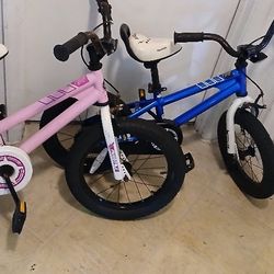 2 Royalbaby Kid's Bikes Pink One Is Size 16" Blue One Size 14" $25 Both Of Them