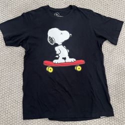 Kaws x Uniqlo x Peanuts Snoopy Skateboarding Tee