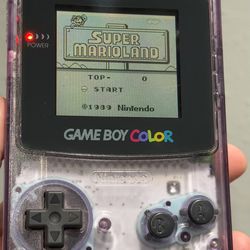 Gameboy Color Atomic Purple with Super Mario Land