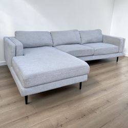 LIGHT GREY SECTIONAL COUCH (Living Spaces)