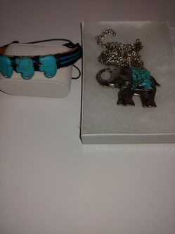 Elephant medallion with turquoise center. Leather bracelet with turquoise elephants.