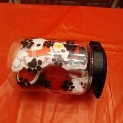 Dog treat jar w/ holiday toys. The second picture shows the toys.