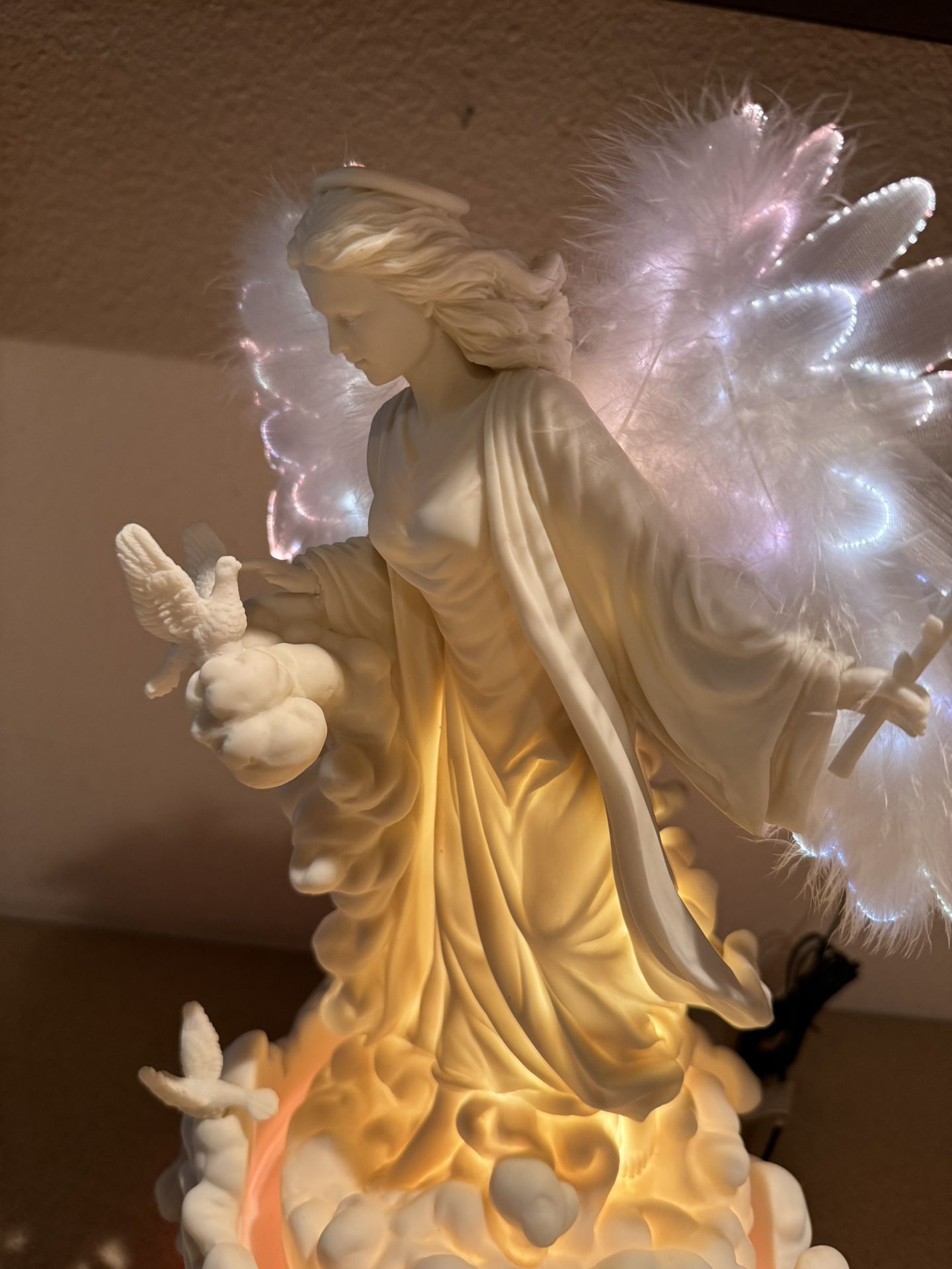 Rotating Fiber Optic Mark Klaus Angel Statue