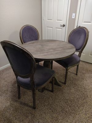 Photo Beautiful West Elm wooden dining table with set of 3 chairs! Excellent used condition! 36 inches diameter, 30 inches tall!