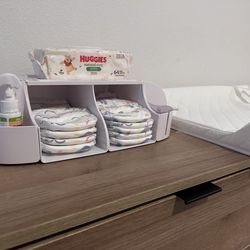 Changing pad and caddy