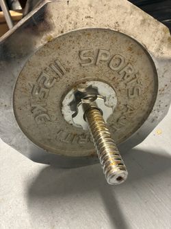 25-pound weight plates and barbell