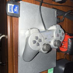 PS2 SLIM SILVER WITH GAMES