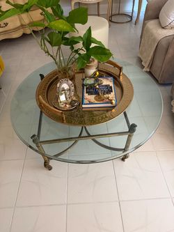 Coffee Table. Vintage Hollywood Regency / French Provincial brass and glass