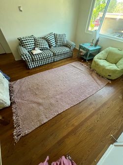 Pink Woven Area Rug with Fringe