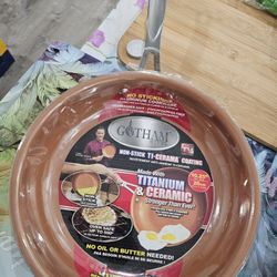 New Gotham steel titanium 10-in frying pan. Never used. 