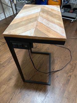 Wooden side table with charging port