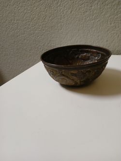 Brass embossed animal theme bowl