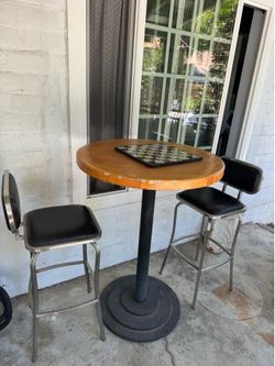 Bar table and two chairs