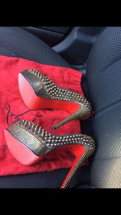 GOLD SPIKES RED BOTTOMS