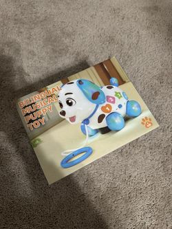 NEW-english/spanish musical puppy toy