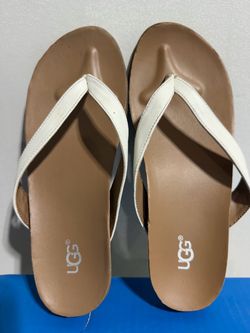 Kids size 4c Ugg slippers.