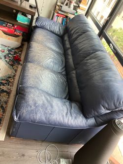 Blue leather couch and sofa