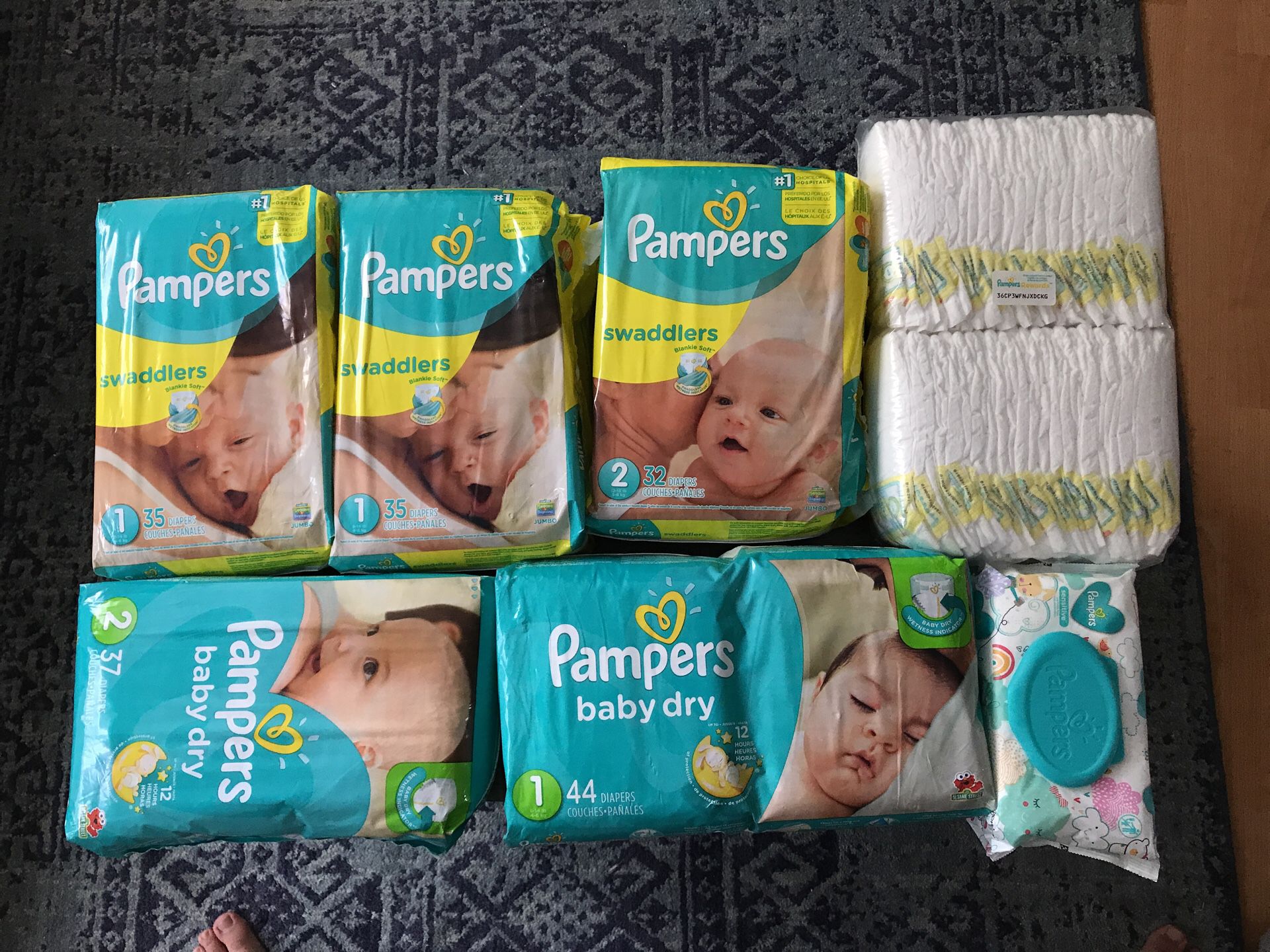 Assorted Baby Diapers and Wipes