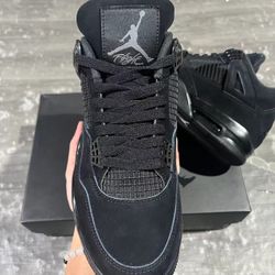 black cat jordan 4s