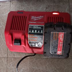 Milwaukee battery charger with one battery included.