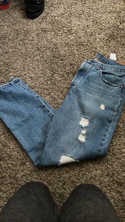 Distressed Light Wash Denim Jeans