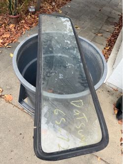 Datsun 521 Rear Window with OEM Rubber