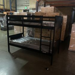 Twin over twin bunk bed. White or espresso. Assembly required. Assembly not included. Taxes included. Free delivery.  Bunk Bed only without Assembly-$