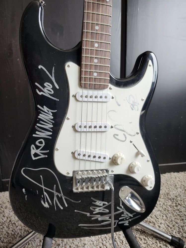 Autograph guitars by Drowning Pool