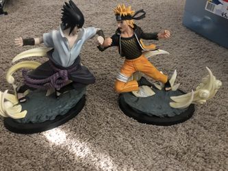 Naruto And Sasuke Statues