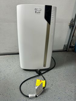 Delonghi Penguino portable Air Conditioning unit in new condition