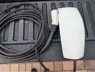 Original Tesla charger for sale. Barely used and in excellent condition. Works perfectly and is practically like new.