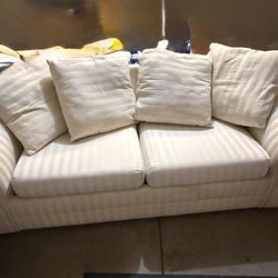 Beautiful Beige Color Sofa That Transforms Into A Bed 