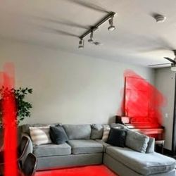 Gray Sectional Sofa with Pull-Out Queen Bed – Removable Covers – Good Condition