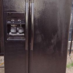 Whirlpool Side By Side Refrigerator $550.00