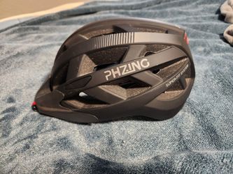 bike helmet phzing Bicycle Brim Uses 4 Velcro straps (2 front and 2 rear) threaded through the helmet vents for a secure fit How to fit a helmet