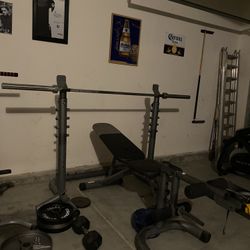 Bench Press With Weights And Bar !!!  Good Condition  For Barter Or Trade For Trailer 