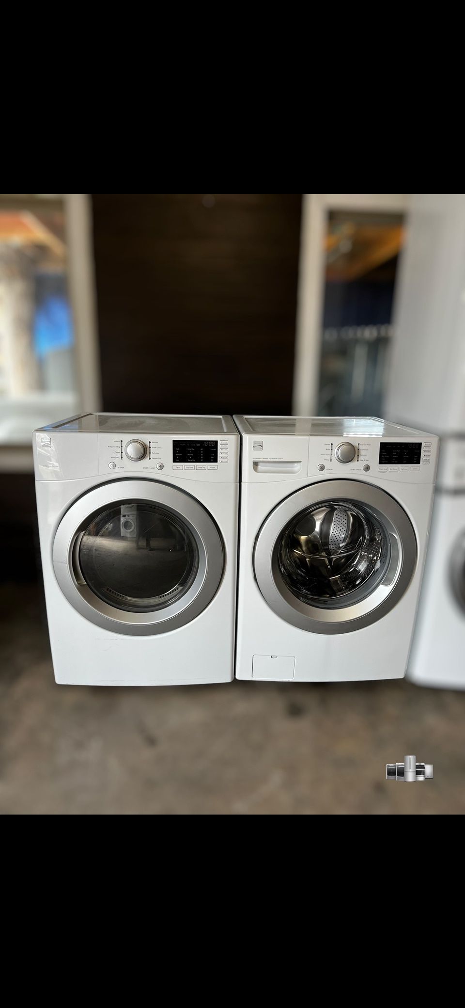 Kenmore washer and electric dryer set.