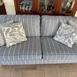 Blue and white striped sofa, comes with pillows