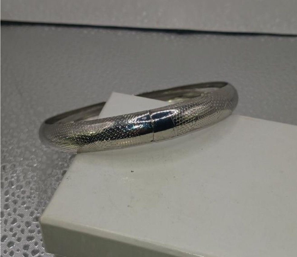 Vintage plastic silver bracelet