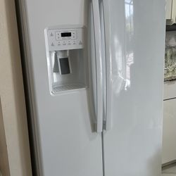 White GE Refrigerator side by side