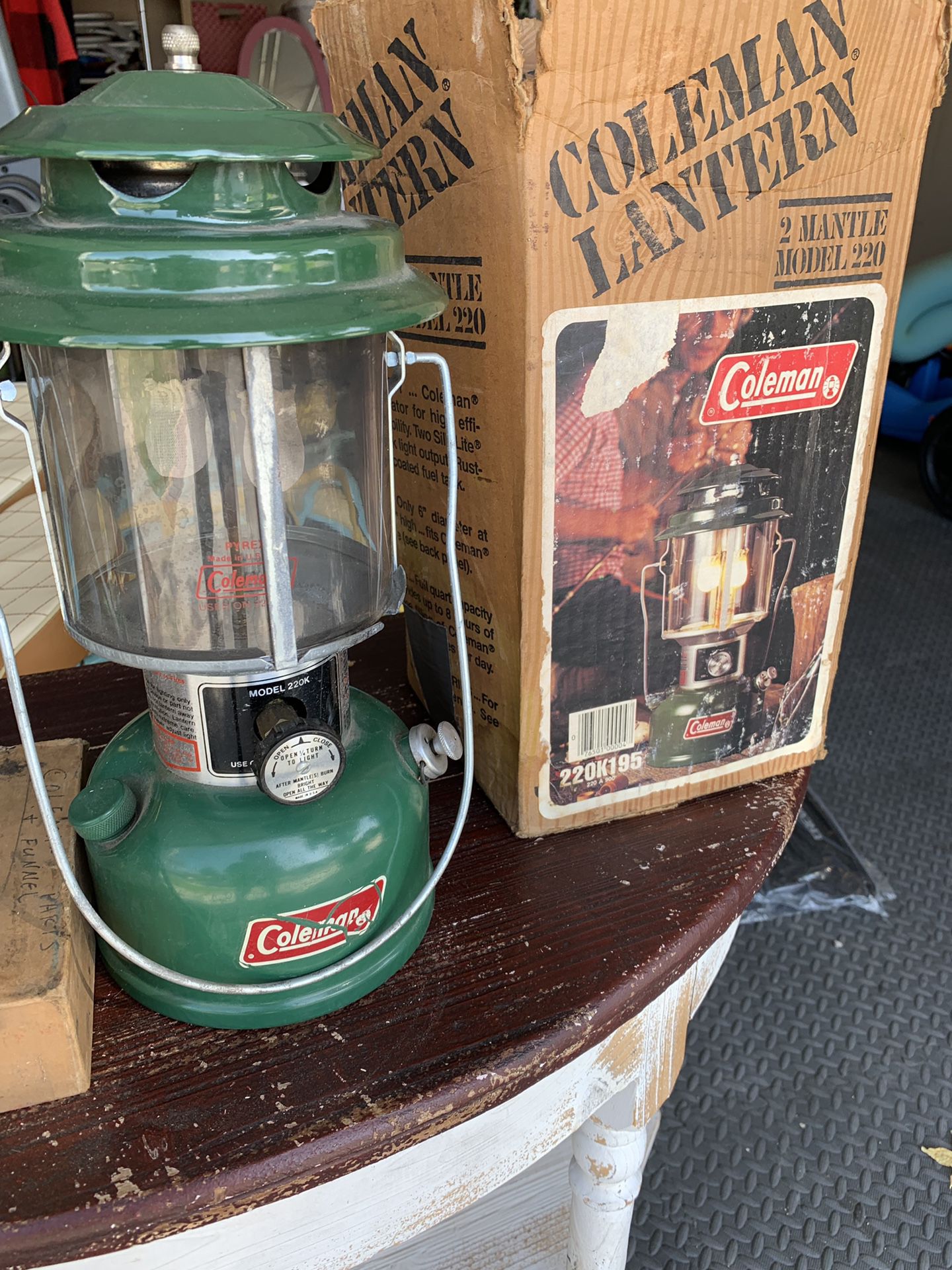 1981. Coleman 220k lantern with fuel funnel